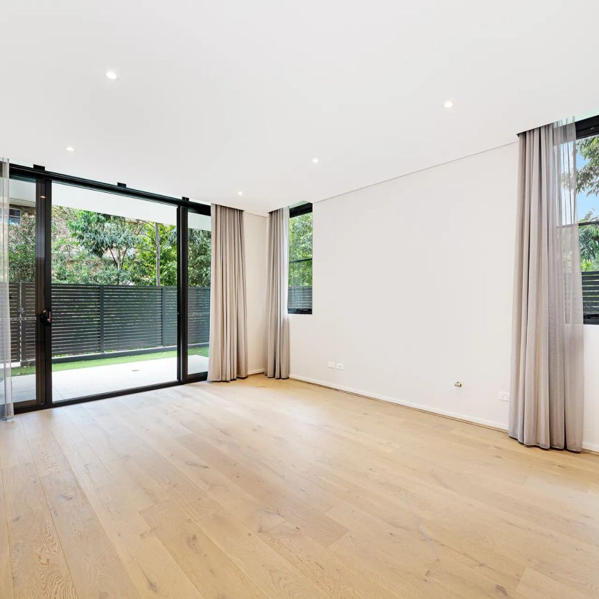 Partially Furnished Three Bedroom Apartment in Desirable Location - Photo 1