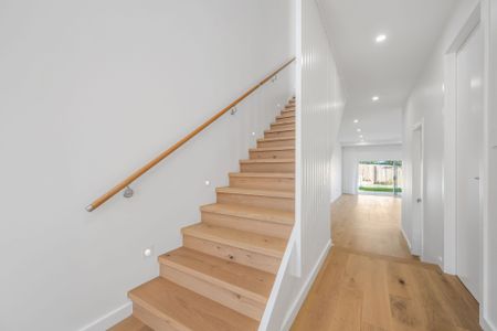 Coastal Living at Its Finest - Modern 3-Bedroom Duplex Steps from the Beach - Photo 4