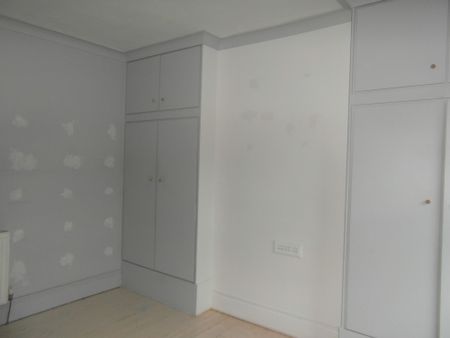 Two‑bed terraced home with modern kitchen, family bathroom and spacious rear garden. Central heating, double glazing and on‑street parking. Close to shops and amenities. Unfurnished and available now. Council Tax A. - Photo 2