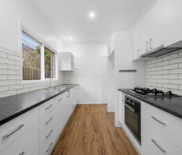 Renovated 3 Bedroom Townhouse in Great Location - Photo 6