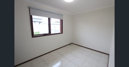 IMMACULATE FRESHLY PAINTED 3 BEDROOM BRICK HOME - Photo 3