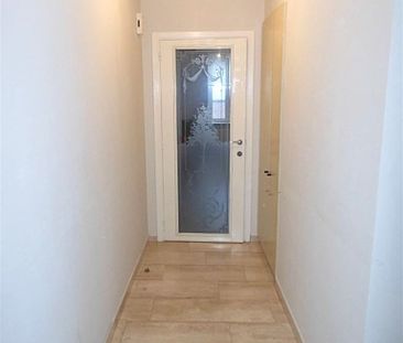 Gezellig dakappartement met 1 slaapkamer vlakbij de Markt. - Photo 2