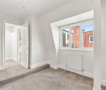 Excellent large newly refurbished five-bedroom family home with lots of light and entertaining space, and stunning large kitchen/family room leading to a good sized lawned South facing garden and off street parking for two cars. - Photo 1