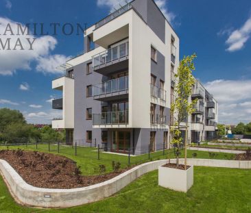 Nowoczesne i komfortowe mieszkanie w inwestycji Małe Błonia - Zdjęcie 2