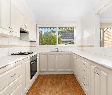 PRIVATE UNIT IN TREE LINED STREET - Photo 1