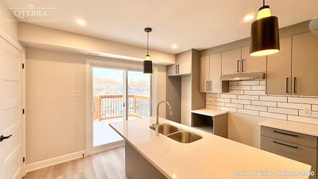 CHARMING 2-BEDROOM MAIN LEVEL UNIT WITH UPGRADED FINISHES - Photo 5