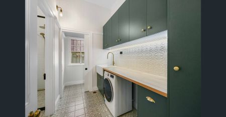 Elegant Victorian Home with Timeless Charm - Photo 4