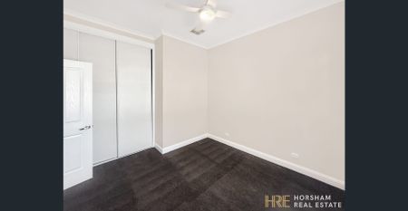 3-Bedroom Home with Large Shed - Photo 2