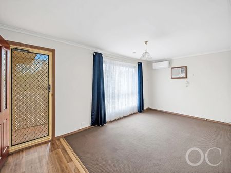 Open the Door to Comfortable Family Living in a Spacious Burton Home - Photo 2