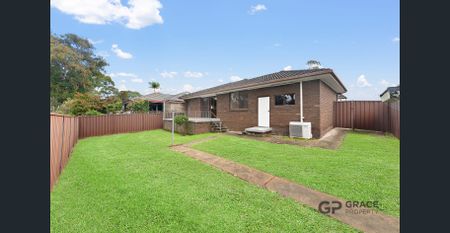 Charming 4-Bedroom Family Home in Prime Location - Photo 2