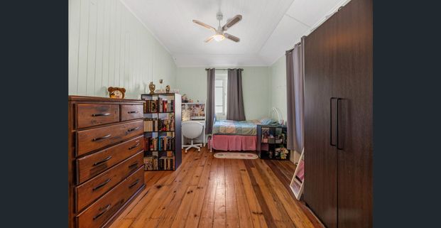 Spacious Family Home on a Large Block - Convenient Darra Location - Photo 1