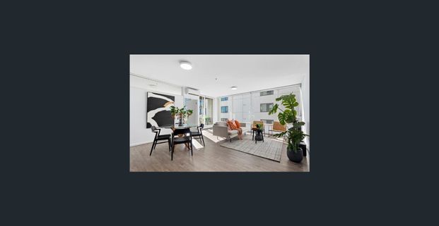 Light-Filled Corner Apartment with Sweeping City Views - Photo 1