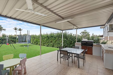 Air-Conditioned Renovated Three-Bedroom Family Home with Electric Cook-Top, Dishwasher, Timber Floors and a Four Car Garage! - Photo 3