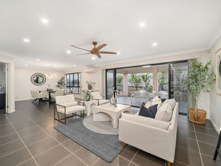 MODERN HOME WITH MULTIPLE LIVING AREAS + SOLAR - Photo 2