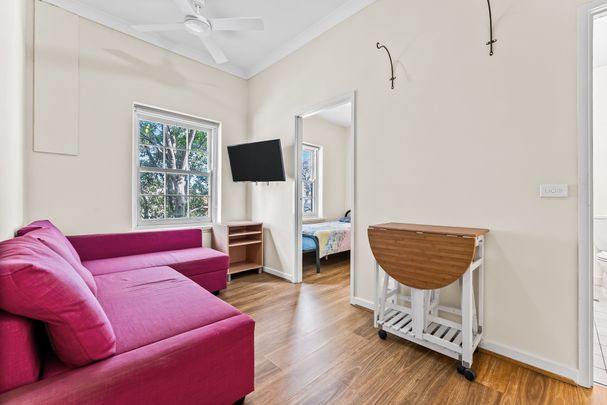 Fully Furnished Gem with Parking — City Living Made Easy - Photo 1