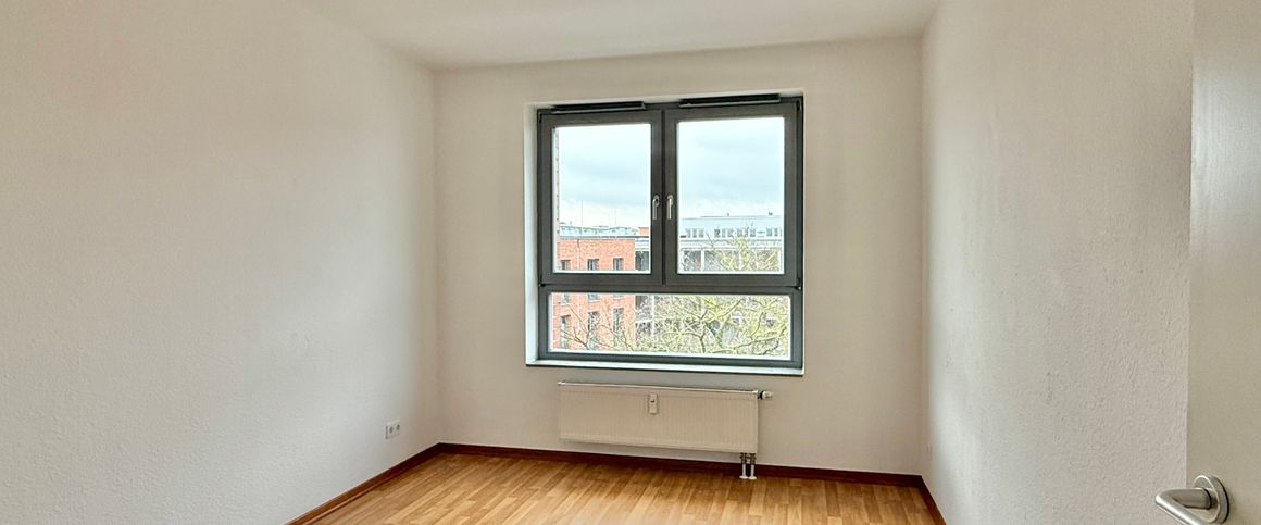 Helle 3-Zimmer-Wohnung mit guter Aufteilung & Balkon - Foto 1