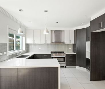 Modern Family Home with Basement Parking - Photo 3