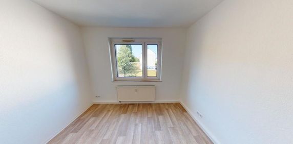 Mit Blick ins Grüne gelegene 2-Raum-Wohnung mit Balkon - Foto 2