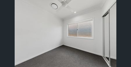 Modern 4-Bedroom Home in Highly Sought-After Kinross Estate - Photo 5