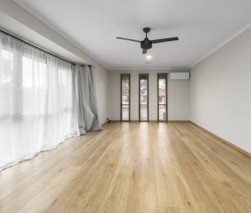 Bright, Comfortable, and Ideally Located - Photo 6