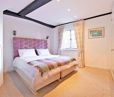 A charming Grade II listed riverside cottage set in the heart of Et... - Photo 4