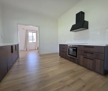 Fully Renovated Home with Stunning City Views - Photo 3