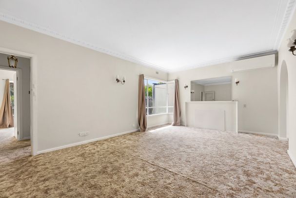 Immaculate Three-Bedroom Home in the Highly Desirable McKinnon School Zone - Photo 1