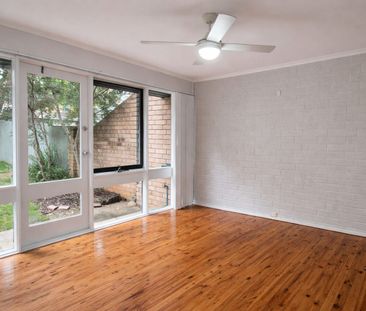 Three Bedroom Townhouse with Air-Conditioning - Photo 1