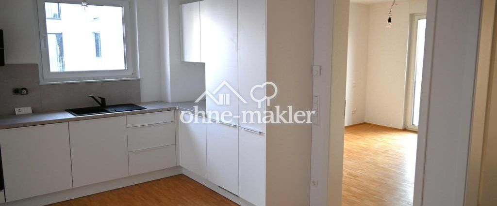 Erstbezug Neubau 2-Zimmerwohnung mit Balkon, Küche, Kellerraum und Tiefgaragenstellplatz - Foto 1