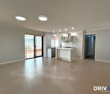 Spacious, Stylish & Elevated Family Living With Sweeping Views - Photo 3