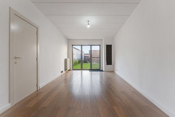 Gelijkvloers appartement met 1 à 2 slaapkamers, tuintje en garagebox - Photo 1