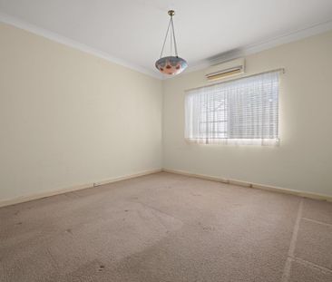 Perfect for Growing Families – Spacious Home with a Huge North-Facing Yard! - Photo 5