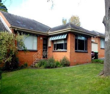 Mitcham - Photo 1