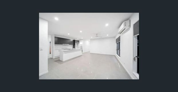 SPACIOUS FOUR-BEDROOM HOME WITH ALFRESCO LIVING - Photo 1