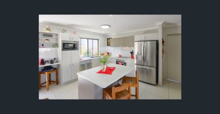 Situated in the quiet suburb of Springfield Lakes, this beautiful property is just waiting for you to call it home! - Photo 3