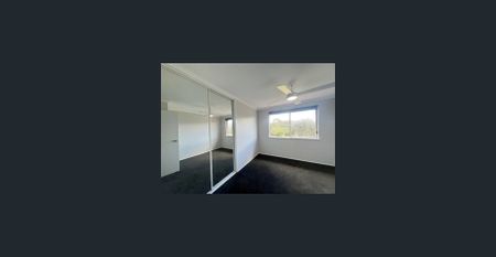 Fully Renovated Townhouse in Ideal Location - Photo 5