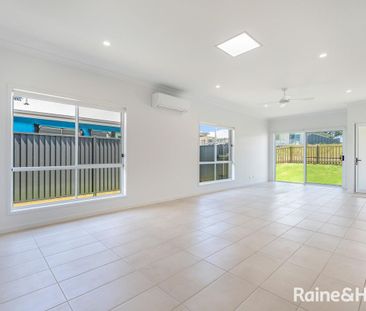 Modern Three-Bedroom Home in a Prime Location - Photo 2