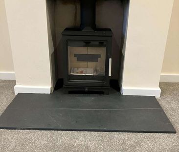 A well-presented two-bedroom semi-detached cottage situated in an a... - Photo 2