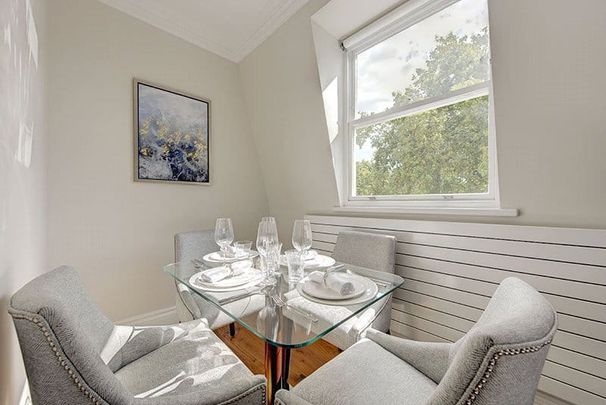 This beautifully interior-designed two-bedroom apartment has been finished to the highest standards, seamlessly blending high-end modern finishes with original Grade II listed building. Minimum Tenanacy Length: 12 months EPC rating: D | Council Tax Band F - Photo 1