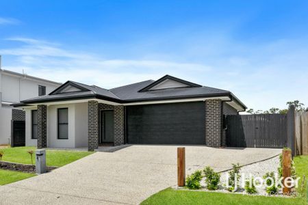 Modern Family Home with Side Access - Photo 2