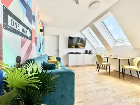 Stilvolle Dachgeschossresidenz mit hochwertiger Ausstattung und urbanem Wohnkomfort | ZELLMANN IMMOBILIEN - Photo 2