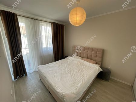 De inchiriat apartament modern cu 2 camere decomandate balcon si loc parcare in zona Brana din Selimbar - Photo 3