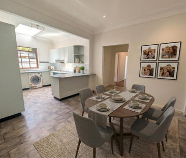 Ultra-Convenient 4 Bedroom Family Home - Steps to Bus & Schools - Photo 2