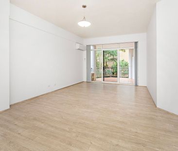 Spacious & Convenient Living in a Well-Maintained Complex - Photo 1
