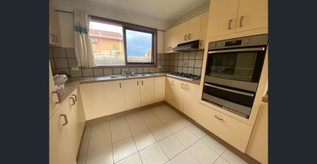 REFRESHED THREE BEDROOM TOWNHOUSE - Photo 3