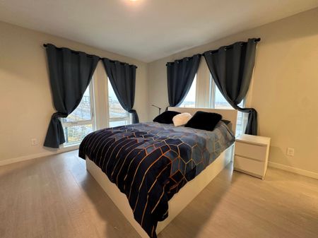 Private Rooftop Patio & Bonus Room | 2 Bed Townhouse In Vibrant Seton - Photo 5