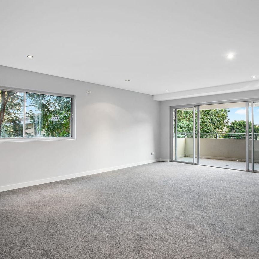 Feature-Packed Modern Apartment in a Peaceful Setting - Photo 1