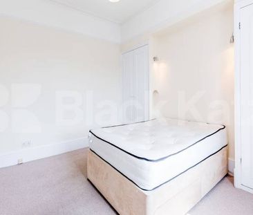 large two bedroom split level property situated in Muswell Hill - Photo 3