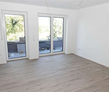 Neubauwohnung mit sonniger Dachterrasse in guter Lage von Schortens! - Foto 2