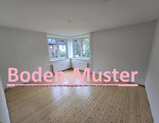 Wohnung mit Holzdielenboden in Düsseldorf-Reisholz, neues Bad - Foto 1